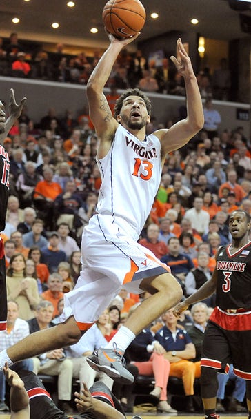 No. 3 Virginia loses leading scorer but holds off No. 9 Louisville